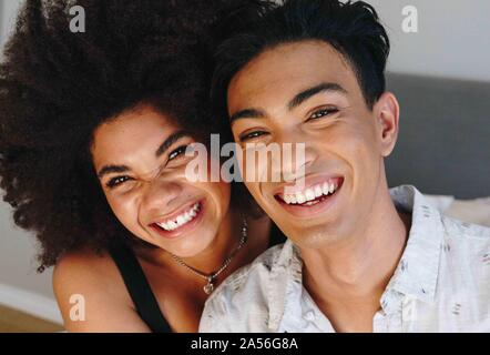 Happy young woman and boyfriend, head and shoulder portrait Stock Photo