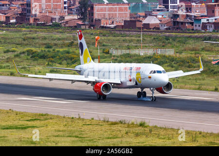 Cusco, Peru – February 2, 2019: Vivaair Airbus A320 airplane at Cusco airport (CUZ) in Peru. Stock Photo