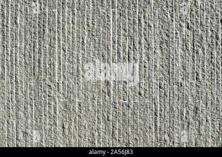 White and gray textured surface with vertical shadow lines. Stock Photo