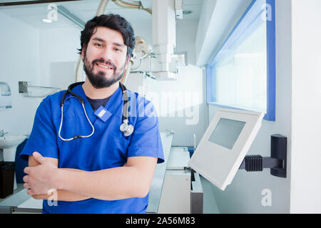 Young male radiographer in radiology department, portrait Stock Photo