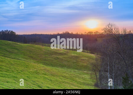 Sunrise in the Spring Over a Field.