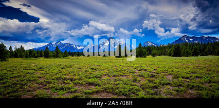 Storm clouds over the Grand Teton mountain range. Stock Photo