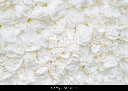 flower paper-craft texture background. White rose. unnatural artificial flowers Stock Photo