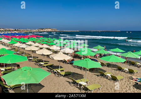 Umbrellas on the beach in Rethymno Stock Photo