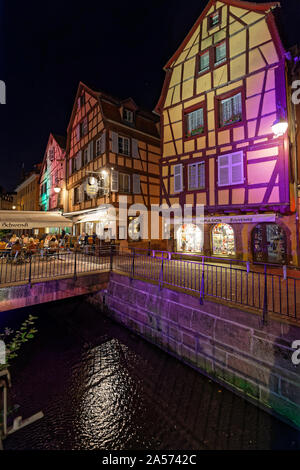 COLMAR, FRANCE, October 11, 2019 : Little Venice of Colmar at night. Little Venice is an area of well-preserved old town crossed by canals of the rive Stock Photo