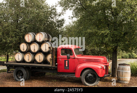 Vintage truck carrying wine casks at the B Cellars Winery in California's Napa Valley Stock Photo