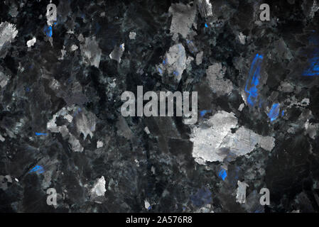 White pattern natural detailed of black marble texture and background for product and interior design. Black granite with blue crystals Stock Photo