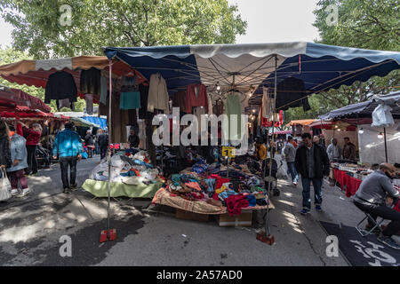 Paris, France - 30th September, 2019: People shopping for bargins at the  Montreuil flea market. one of the oldest flea markets in the capital. It is Stock Photo