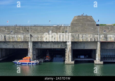 SNSM coast guard boats at the German WW2 Kriegsmarine submarine base in the port of Saint-Nazaire, Loire-Atlantique, France Stock Photo