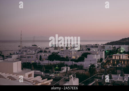 Mykonos, Greece - September 19, 2019: High angle view of the buildings in Platis Gialos, a popular area and beach on the south coast of Mykonos, at du Stock Photo