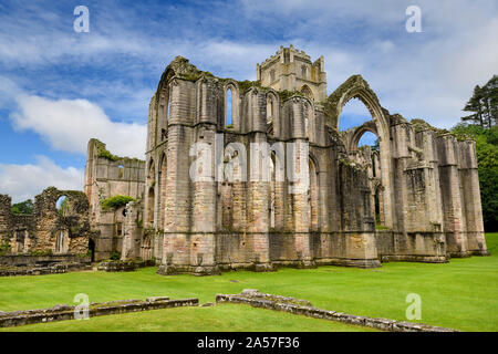 Chapter House and Fountains Abbey Cistercian monastery church from Chapel of Altars from ruins of the Abbot's House North Yorkshire England Stock Photo