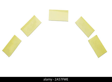Yellow post it notes on a white background, put your own text on them, space for text isolated Stock Photo