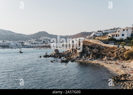 Mykonos, Greece - September 19, 2019: View of Hidden Beach and Platis Yialos beach on background in Mykonos, a popular travel destination in Greece. S Stock Photo