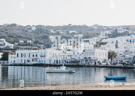 Mykonos Town, Greece - September 20, 2019: Boats moored in water by new port in Hora, also known as Mykonos Town, capital of the island and one of the Stock Photo