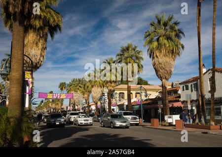 Traffic on road with palm trees at the roadside, South Palm Canyon Drive, Palm Springs, Riverside County, California, USA Stock Photo