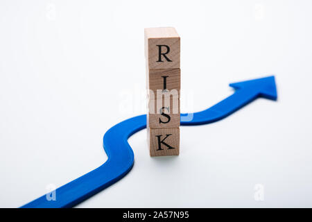 Arrow Going Around Word Tax In Avoid Risk Concept Stock Photo
