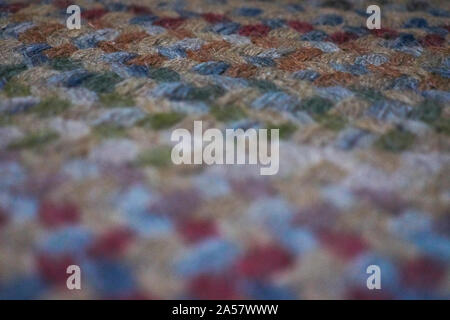 Close up image of a roughly tied seventies multicoloured textured carpet Stock Photo