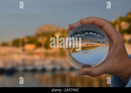 Looking through crystal ball to Javea port and Montgo mountain on the Costa Blanca, Spain. Creative refraction photography. Concept, Dream Holiday Stock Photo