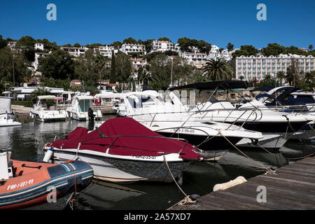 Boats in the harbour in Cala Galdana, Menorca Stock Photo