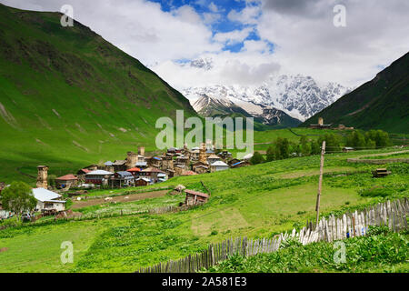 The mountain village of Ushguli with the Shkhara peak (5068 m) in the background. A UNESCO World Heritage Site. Upper Svanetia, Georgia. Caucasus Stock Photo