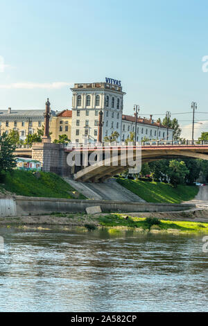 embankment of the Western Dvina river, Vitebsk. Belarus. 28.07.2019.  Kirovsky bridge is a bridge in the city center across the Western Dvina river. I Stock Photo