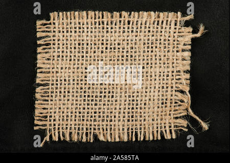 Linen cloth on black background clsoe up. view Stock Photo