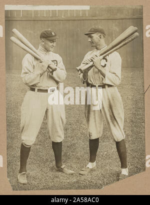 Ty Cobb, Detroit, and Joe Jackson, Cleveland, standing alongside each other, each holding bats Stock Photo