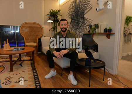 James Doran, 26, from Liverpool, who played as single mother 'Sammie',in his apartment at The Circle in Salford, Manchester, ahead of the live final of the second series of Channel 4's The Circle. Stock Photo