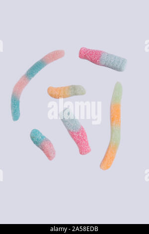 Sweet gummy worms with a sugar coating. Stock Photo