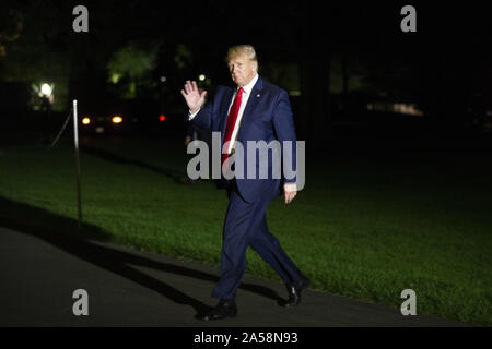 Washington, District of Columbia, USA. 18th Oct, 2019. US President Donald J. Trump walks across the South Lawn upon his return to the White House by Marine One. Trump returns from a trip to Texas Credit: Michael Reynolds/CNP/ZUMA Wire/Alamy Live News Stock Photo