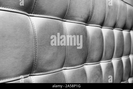 Tufted grey leather headboard texture, used for background Stock Photo