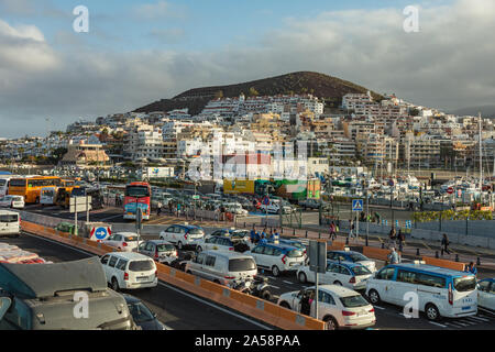 Harbor in Los Cristianos, Tenerife, Spain - May 25, 2019 - Ferry Armas to La Gomera early morning in the port of Los Cristianos docking to the harbour Stock Photo