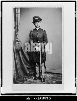 Unidentified Union officer, full-length portrait, standing, with both hands of sword, facing front Stock Photo