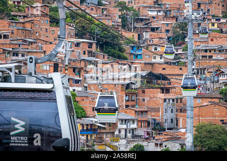 Metrocable or Cable car or gondola lift, H line, public transport, over Comuna 8, Comuna ocho, Medellín, Colombia Stock Photo