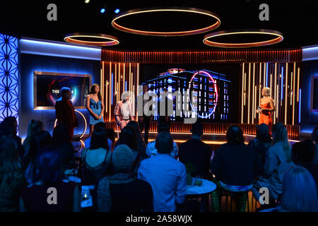 (left to right) Finalists Tim Wilson, Georgina Elliott, Paddy Smyth, Woody Cook, James Doran and host Emma Willis during the final of the second series of Channel 4's The Circle in Salford, Manchester. PA Photo. Picture date: Friday October 18, 2019. See PA story SHOWBIZ Circle. Photo credit should read: Peter Powell/PA Wire Stock Photo