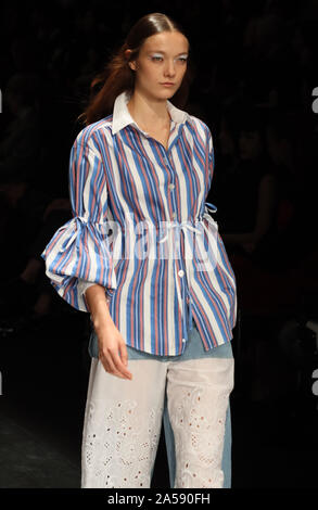 Tokyo, Japan. 18th Oct, 2019. A model displays a creation of Japanese designer Tae Ashida for her 2020 spring and summer collection as a part of Rakuten Fashion Week Tokyo in Tokyo on Friday, October 18, 2019. Credit: Yoshio Tsunoda/AFLO/Alamy Live News Stock Photo