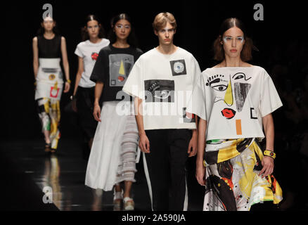 Tokyo, Japan. 18th Oct, 2019. Models display creations of Japanese designer Tae Ashida for her 2020 spring and summer collection as a part of Rakuten Fashion Week Tokyo in Tokyo on Friday, October 18, 2019. Credit: Yoshio Tsunoda/AFLO/Alamy Live News Stock Photo