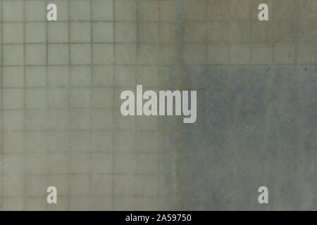 Matt transparent plate in front of metal bars squares, abstract textures Stock Photo