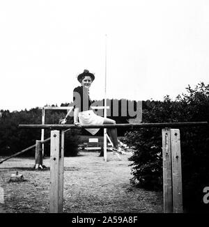 Eva Braun Collection (album 2) - Young woman on a parallel bar ca. late 1930s Stock Photo