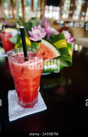 Watermelons smoothy on the table. This photo was taken while traveling in central Vietnam, the fall of 2019. Stock Photo