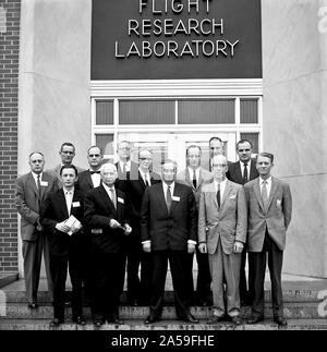 Russian Scientists from the Commission of Interplanetary Travel of the Soviet Academy of Science November 21,1959  Left to right: Front row: Yury S. Galkin, Anatoly A. Blagonravov, and Prof. Leonid I. Sedov (Chair of the Commission for Interplanetary Travel)-Soviet Academy of Science, Leninski Gory, Moscow, Russia  Dr. H.J. E. Reid and Floyd L. Thompson Langley Research Center. Second row: Boris Kit Translator, Library of Congress, Washington, D.C.  Eugene C. Draley and Laurence K. Loftin, Jr. -Langley Research Center  Arnold W. Frutkin and Harold R. Lawrence NASA Headquarters.  Back row: T.Me