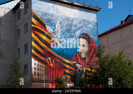 A mural celebrating the Russian revolution. Salekhard, Yamalo-Nenets Autonomous Area, in Arctic Russia. Stock Photo