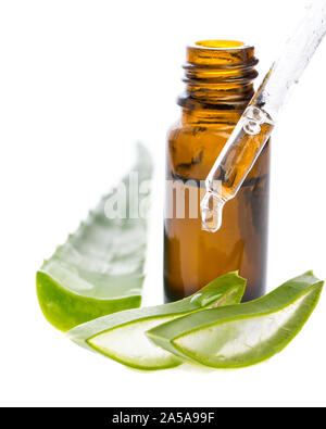 Pieces of aloe vera with vial and pipette isolated on white background Stock Photo