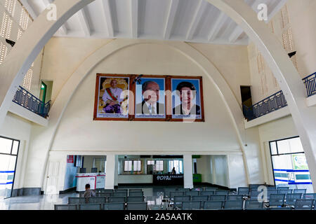 The lobby area is filled with empty seats in the passenger waiting room of the historic art deco train station in Phnom Penh, Cambodia. Stock Photo