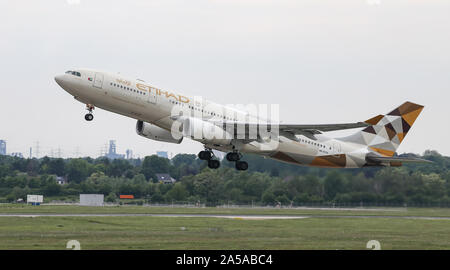 DUSSELDORF, GERMANY - MAY 26, 2019: Etihad Airways Airbus A330-243 (CN 729) takes off from Dusseldorf Airport.