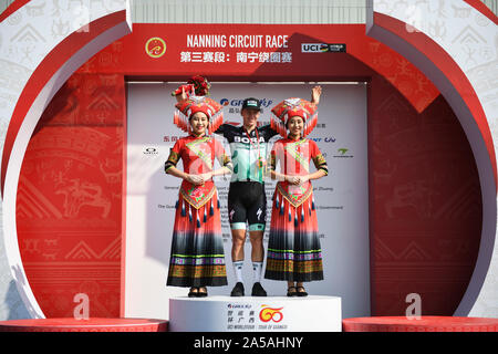 (191019) -- NANNING, Oct. 19, 2019 (Xinhua) -- Stage Winner German Pascal Ackermann (C) of Bora-Hansgrohe celebrates during the awarding ceremony of during the stage three circuit race at the 2019 UCI World Tour/Tour of Guangxi in Nanning, capital of south China's Guangxi Zhuang Autonomous Region, Oct. 19, 2019. (Xinhua/Cao Yiming) Stock Photo