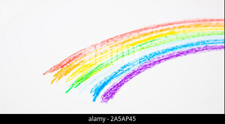 Creative kids, rainbow drawing. Colorful rainbow painting on white color background Stock Photo