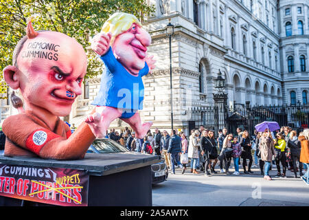 London, UK. 19th Oct, 2019. Effigies of Boris Johnson being operated like a puppet by Dominic Cummings - Stop Brexit, people's vote march from the west end to Westminster. Credit: Guy Bell/Alamy Live News