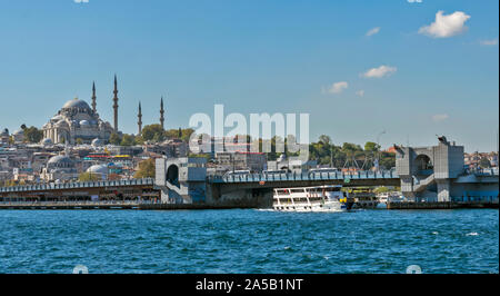 ISTANBUL TURKEY  GALATA BRIDGE AND PASSENGER BOAT THE SULEYMANIYE  MOSQUE ON THE SKYLINE Stock Photo