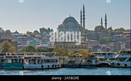 ISTANBUL TURKEY TOURIST BOATS ON THE BOSPHORUS THE SULEYMANIYE MOSQUE ON THE SKYLINE